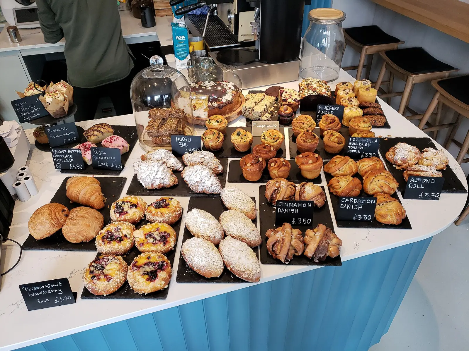 Breads and pastries on a bakery counter. The photo was not taken at an Alpharetta bakery.