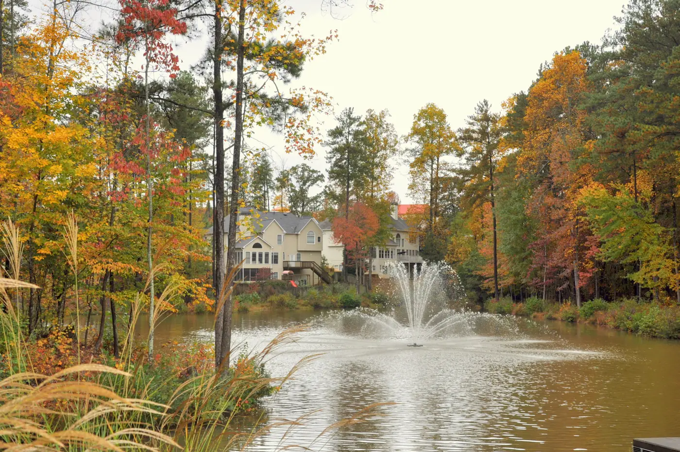 Homes beside a pond in the Lexington Woods neighborhood of Alpharetta