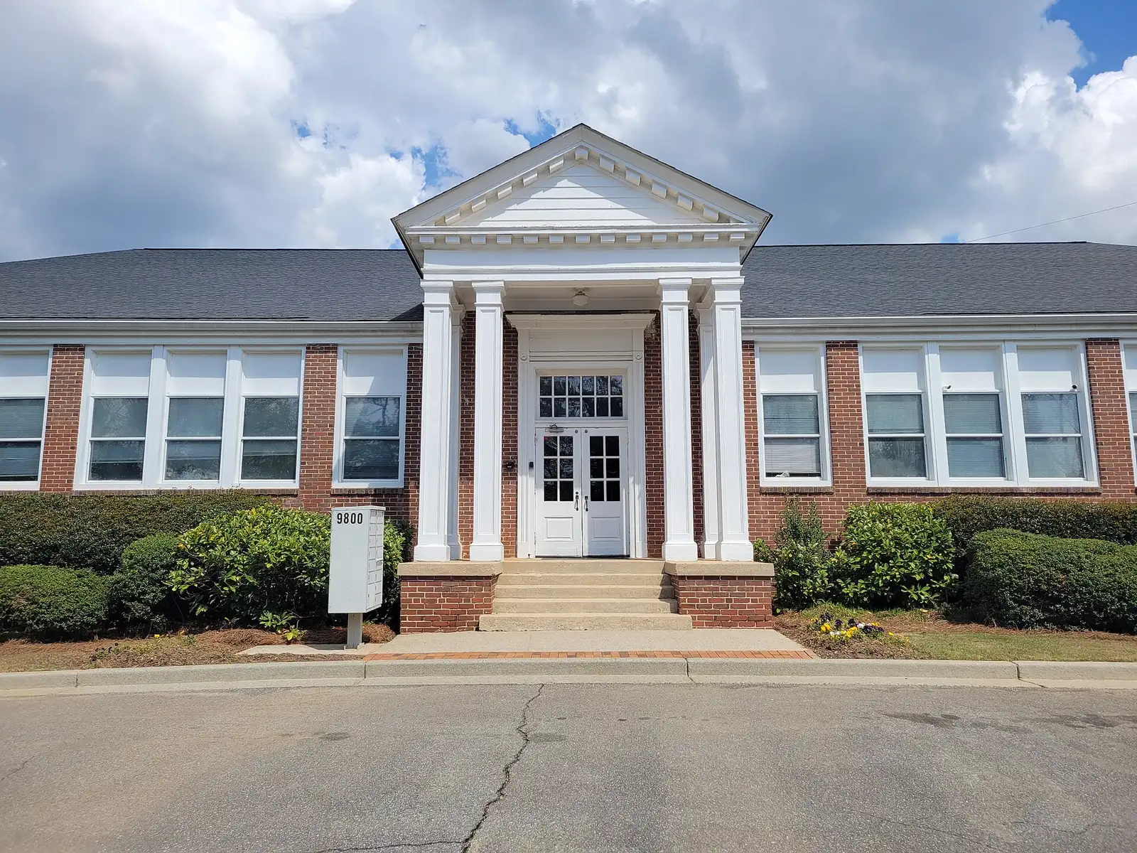The former Warsaw School, under half a mile east of the school, photographed in 2026