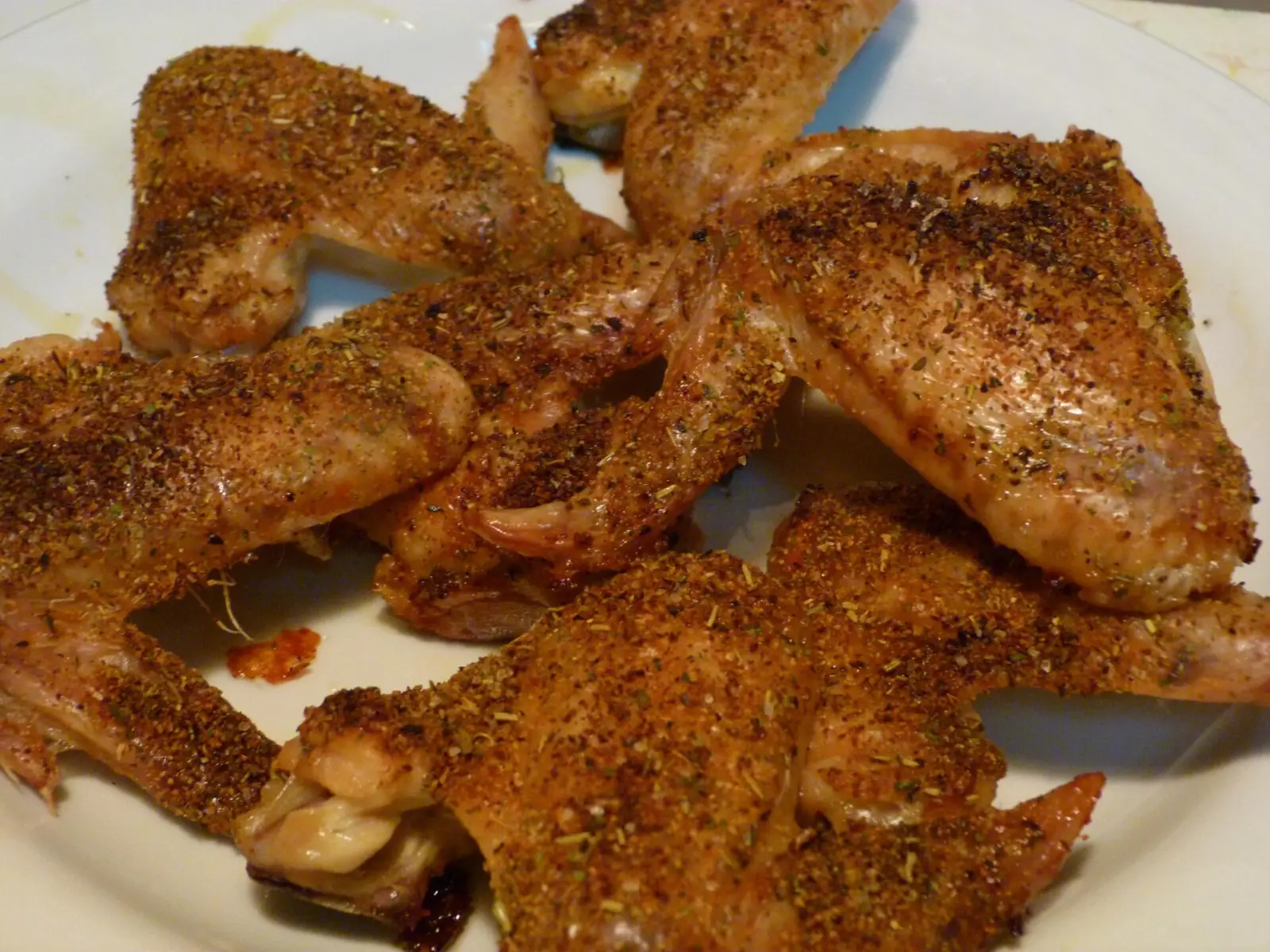 A plate of seasoned chicken wings. The photo was not taken at an Alpharetta restaurant.